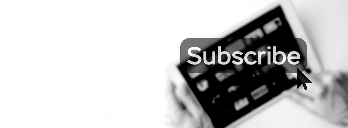 Close up of hands holding tablet with the word subscribe as an overlay